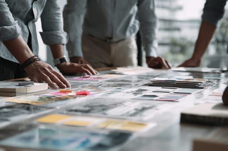 Photo of a group of print managers handling project logistics