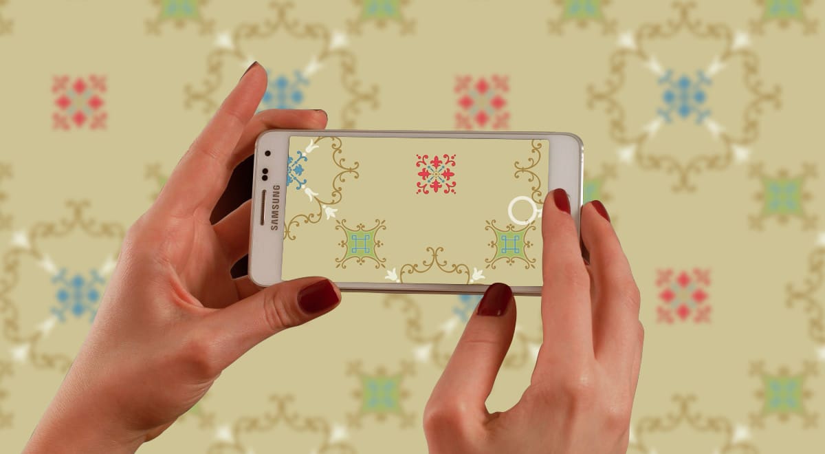 Photographing a wallpaper sample to send for assessment