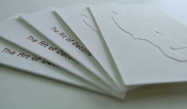 Close up image of an embossed business card